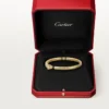 Bransoletka Panthere De Cartier, mały model, częściowo wysadzana kamieniami