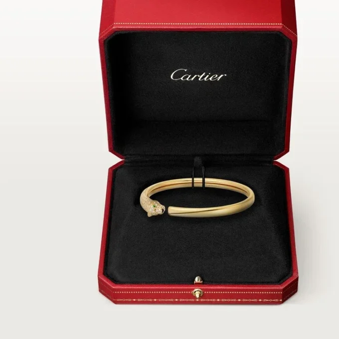 Bransoletka Panthere De Cartier, mały model, częściowo wysadzana kamieniami
