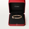 Bransoletka Panthere De Cartier, mały model, częściowo wysadzana kamieniami