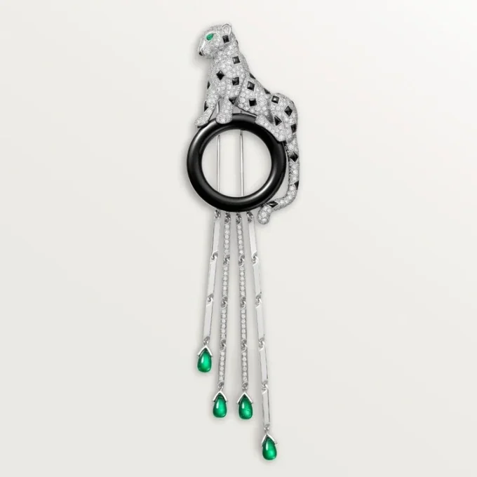 Broszka Panthere De Cartier – białe złoto, szmaragdy, onyks, diamenty – Cartier