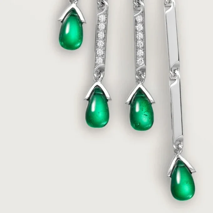 Broszka Panthere De Cartier – białe złoto, szmaragdy, onyks, diamenty – Cartier