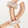 Kolczyk Ecrou De Cartier na prawym uchu – różowe złoto, diamenty – Cartier Kolczyk Ecrou De Cartier na prawym uchu – różowe złoto, diamenty – Cartier