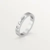 Obrączka ślubna C De Cartier – platyna, diamenty – Cartier