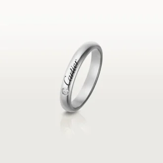 Obrączka ślubna C De Cartier – platyna, diamenty – Cartier