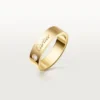 Obrączka ślubna C De Cartier, szerokość 5 mm, 1 diament
