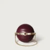 Okrągła torebka z motywem gadroon, Cartier Soir Okrągła torebka z motywem gadroon, Cartier Soir
