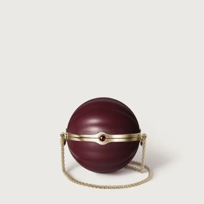 Okrągła torebka z motywem gadroon, Cartier Soir Okrągła torebka z motywem gadroon, Cartier Soir