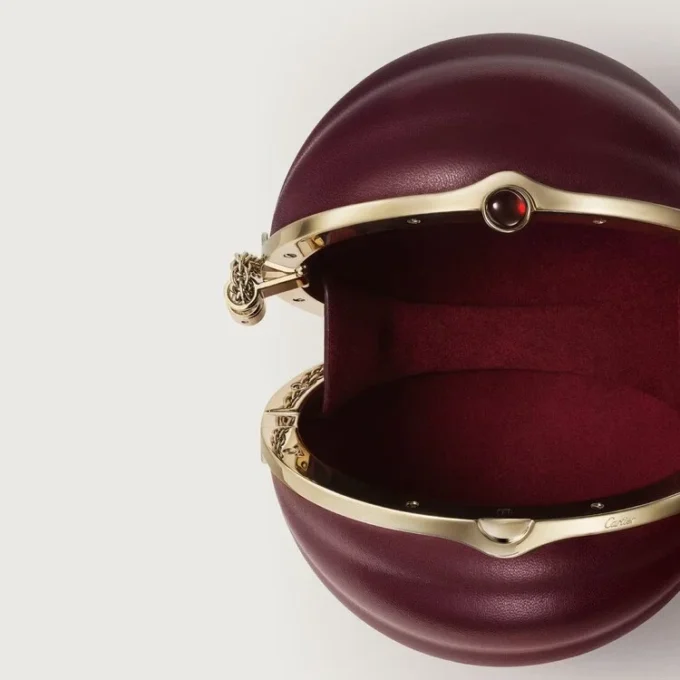 Okrągła torebka z motywem gadroon, Cartier Soir Okrągła torebka z motywem gadroon, Cartier Soir