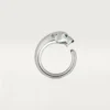 Pierścionek Panthere De Cartier – białe złoto, granaty tsaworytowe, onyks – Cartier