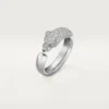 Pierścionek Panthere De Cartier – białe złoto, szmaragdy, onyks, diamenty – Cartier