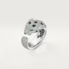 Pierścionek Panthere De Cartier – białe złoto, szmaragdy, onyks, diamenty – Cartier