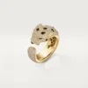 Pierścionek Panthere De Cartier – żółte złoto, szmaragdy, onyks, diamenty – Cartier