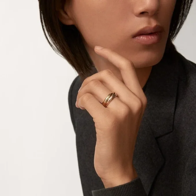 Pierścionek Trinity z trójkolorowego złota, model klasyczny | Cartier Us Pierścionek Trinity z trójkolorowego złota, model klasyczny | Cartier Us