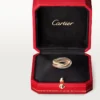 Pierścionek Trinity z trójkolorowego złota, model klasyczny | Cartier Us Pierścionek Trinity z trójkolorowego złota, model klasyczny | Cartier Us