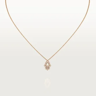 Wisiorek z sercami i symbolami – różowe złoto, diamenty – Cartier